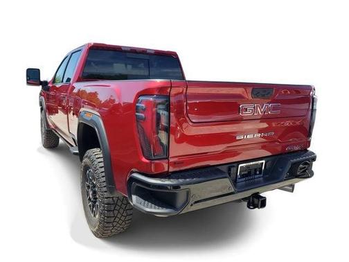 Volcanic Red Tintcoat 2026 GMC Sierra 2500 AT4X
