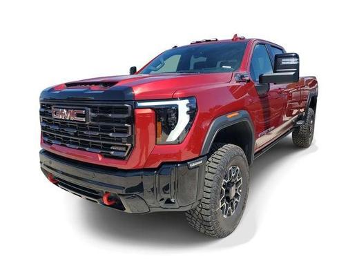 Volcanic Red Tintcoat 2026 GMC Sierra 2500 AT4X