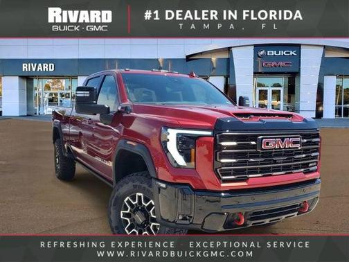 Volcanic Red Tintcoat 2026 GMC Sierra 2500 AT4X