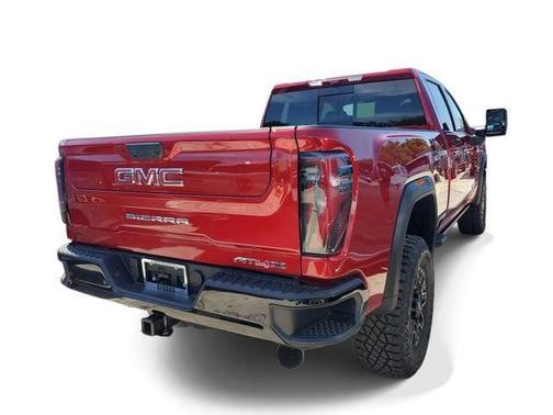 Volcanic Red Tintcoat 2026 GMC Sierra 2500 AT4X