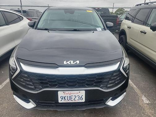 Fusion Orange 2024 Kia Sportage Hybrid LX