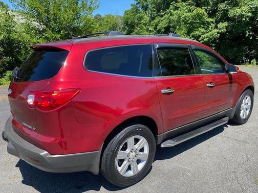 Maroon 2010 Chevrolet Traverse LT