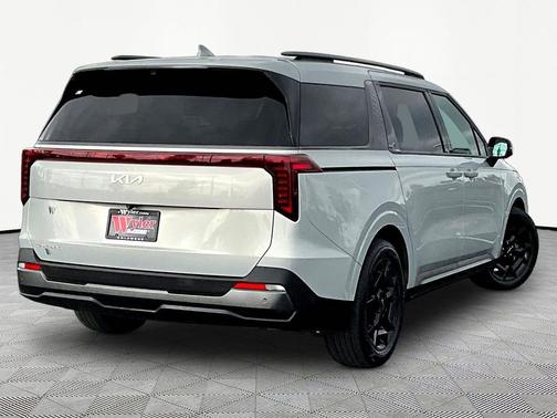Ivory Silver 2025 Kia Carnival SX Prestige