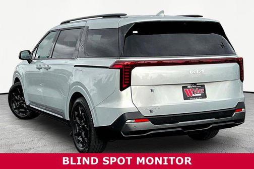 Ivory Silver 2025 Kia Carnival SX Prestige