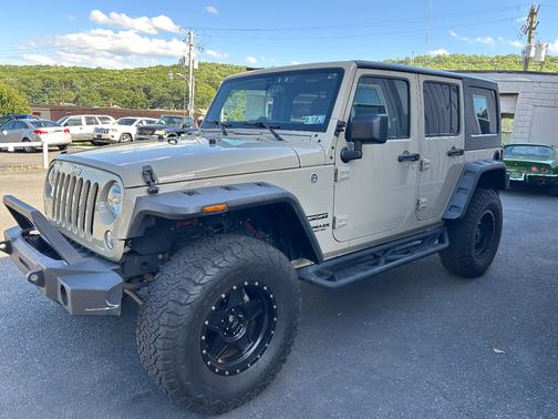 Sand/beige 2017 Jeep Wrangler Unlimited Sport
