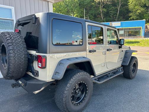 Sand/beige 2017 Jeep Wrangler Unlimited Sport