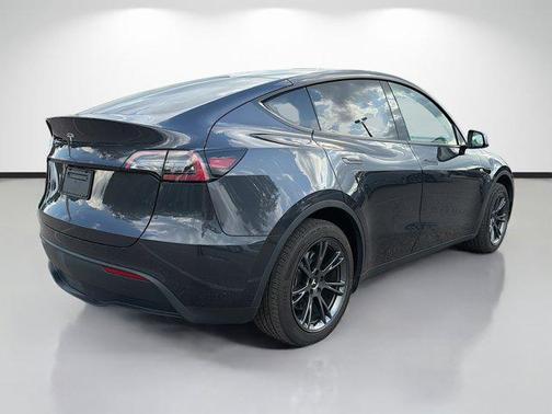 Solid Black 2024 Tesla Model Y Long Range Single Motor Rear-Wheel Drive