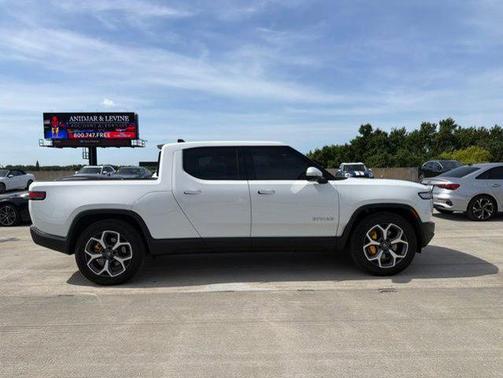 Glacier White 2023 Rivian R1T Adventure Quad Motor Large Pack