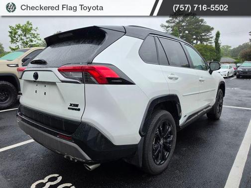Wind Chill Pearl/Midnight Black Metallic 2023 Toyota RAV4 Hybrid SE