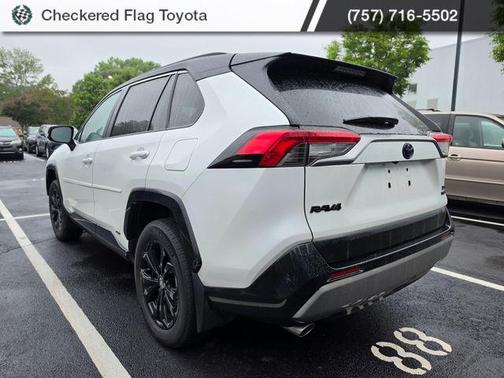 Wind Chill Pearl/Midnight Black Metallic 2023 Toyota RAV4 Hybrid SE