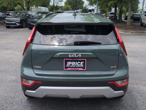 Cityscape Green 2023 Kia Niro Plug-In Hybrid EX