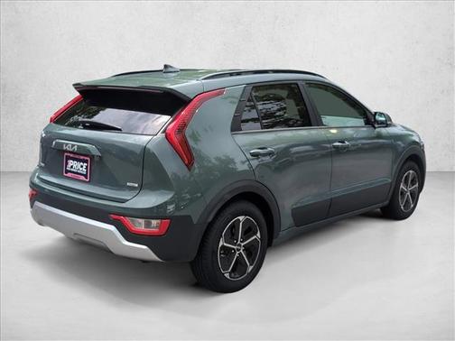 Cityscape Green 2023 Kia Niro Plug-In Hybrid EX