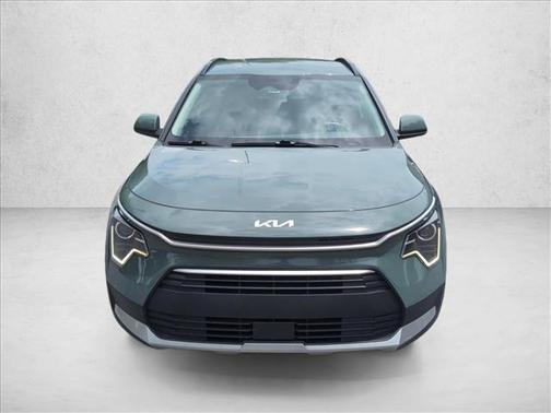 Cityscape Green 2023 Kia Niro Plug-In Hybrid EX