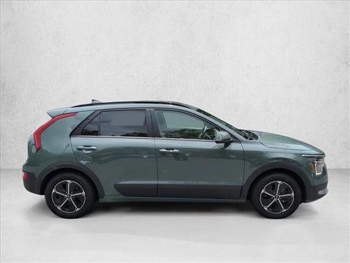 Cityscape Green 2023 Kia Niro Plug-In Hybrid EX
