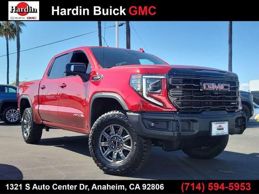 Volcanic Red 2026 GMC Sierra 1500 AT4X