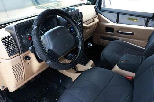 Black 1999 Jeep Wrangler Sport