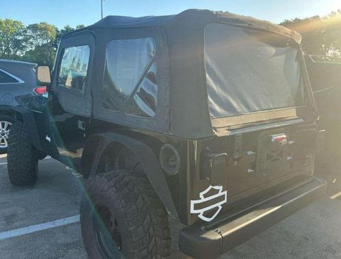 Black 1999 Jeep Wrangler Sport