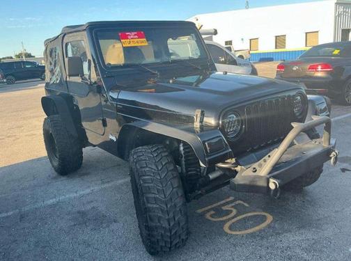 Black 1999 Jeep Wrangler Sport