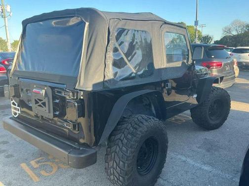 Black 1999 Jeep Wrangler Sport
