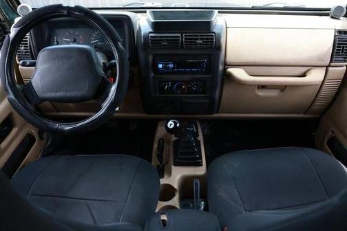 Black 1999 Jeep Wrangler Sport