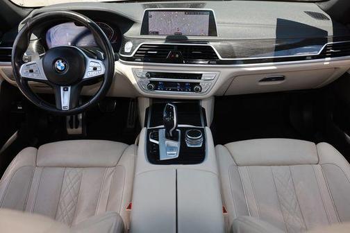 beige 2022 BMW 740 i