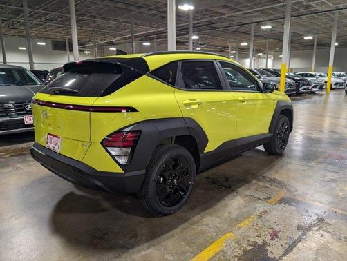 Yellow 2026 Hyundai KONA SEL Sport