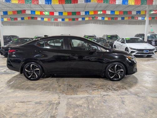 Black 2023 Nissan Versa 1.6 SR