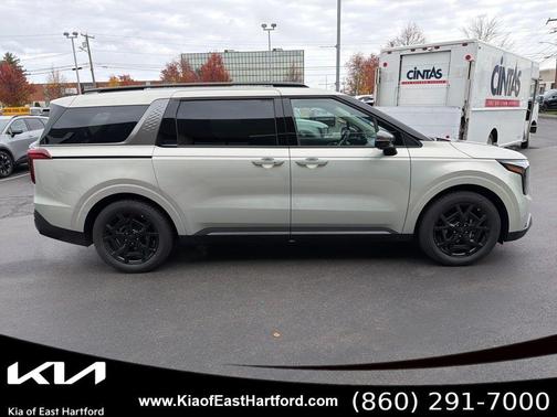 Ivory Silver 2026 Kia Carnival SX Prestige