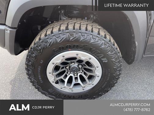 Diamond Black Crystal Pearlcoat 2026 RAM 1500 RHO Crew Cab 4x4 5'7' Box