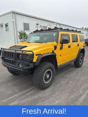 Yellow 2007 Hummer H2 Base