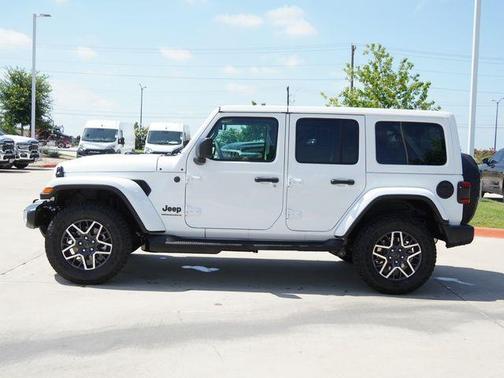 bright white clearcoat 2026 Jeep Wrangler 4-Door Sahara 4x4