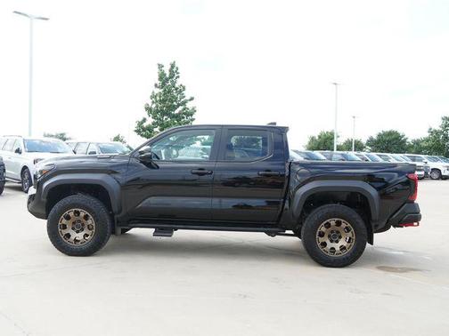 Black 2024 Toyota Tacoma Hybrid Trailhunter
