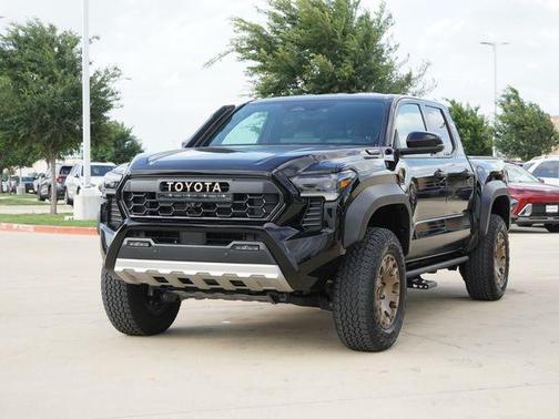 Black 2024 Toyota Tacoma Hybrid Trailhunter