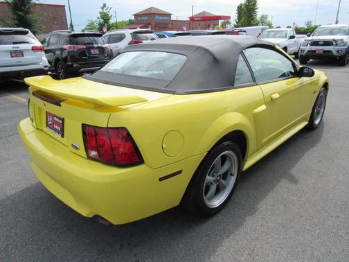 Yellow 2001 Ford Mustang GT