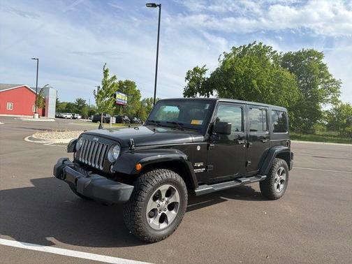 Black Clearcoat 2016 Jeep Wrangler Unlimited Sahara