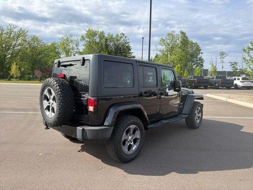 Black Clearcoat 2016 Jeep Wrangler Unlimited Sahara