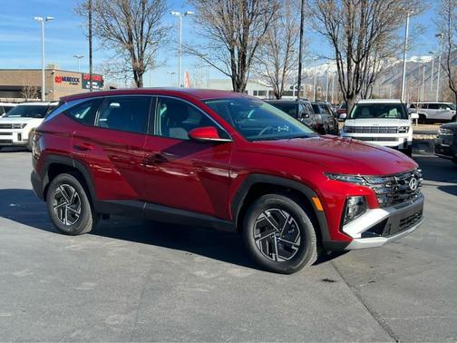 Red 2026 Hyundai TUCSON Hybrid Blue SE