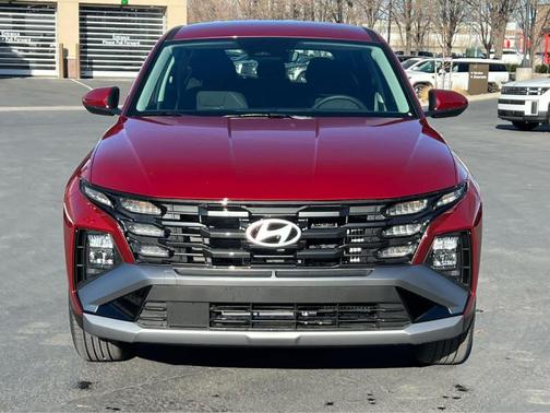 Red 2026 Hyundai TUCSON Hybrid Blue SE