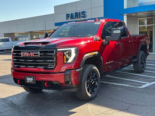 Volcanic Red Tintcoat 2026 GMC Sierra 2500 AT4