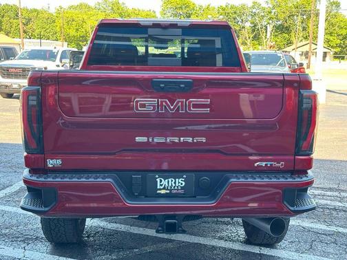 Volcanic Red Tintcoat 2026 GMC Sierra 2500 AT4