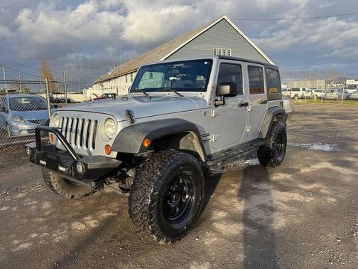 Bright Silver Metallic Clearcoat 2012 Jeep Wrangler Unlimited Sport SUV