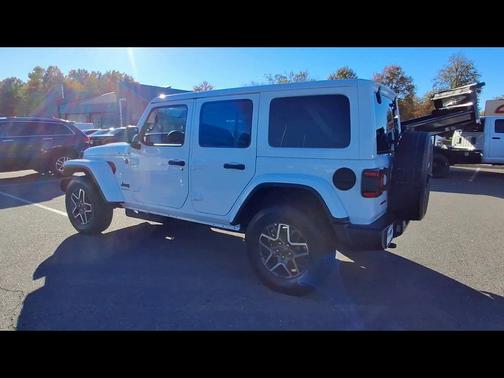 Bright White Clearcoat 2026 Jeep Wrangler 4-Door Sahara 4x4
