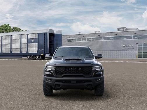 Diamond Black Crystal Pearlcoat 2026 RAM 1500 RHO Crew Cab 4x4 5'7' Box
