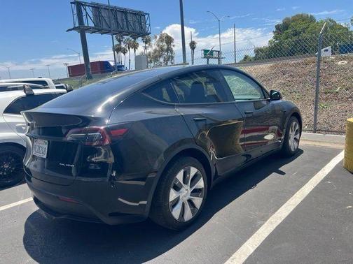 Solid Black 2024 Tesla Model Y Long Range Dual Motor All-Wheel Drive