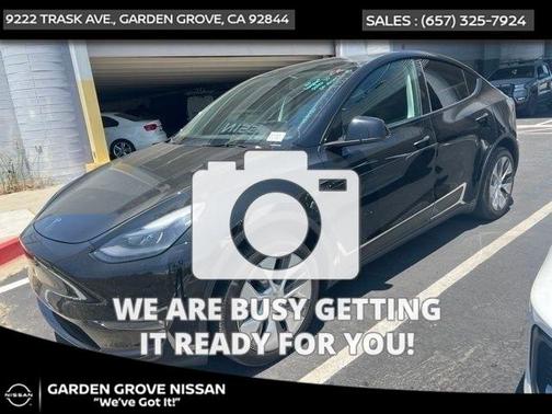 Solid Black 2024 Tesla Model Y Long Range Dual Motor All-Wheel Drive