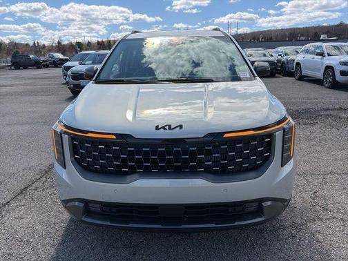 Ivory Silver 2026 Kia Carnival Hybrid SX Prestige