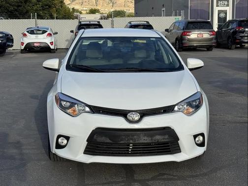Super White 2016 Toyota Corolla LE Plus