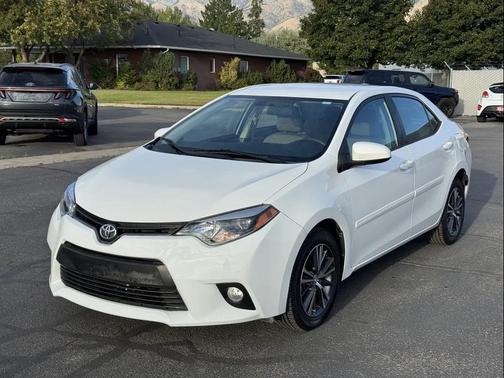 Super White 2016 Toyota Corolla LE Plus