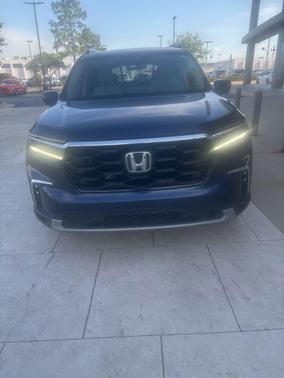 Obsidian Blue 2025 Honda Pilot Touring 8-Passenger