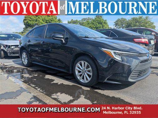 Midnight Black Metallic 2024 Toyota Corolla Hybrid SE